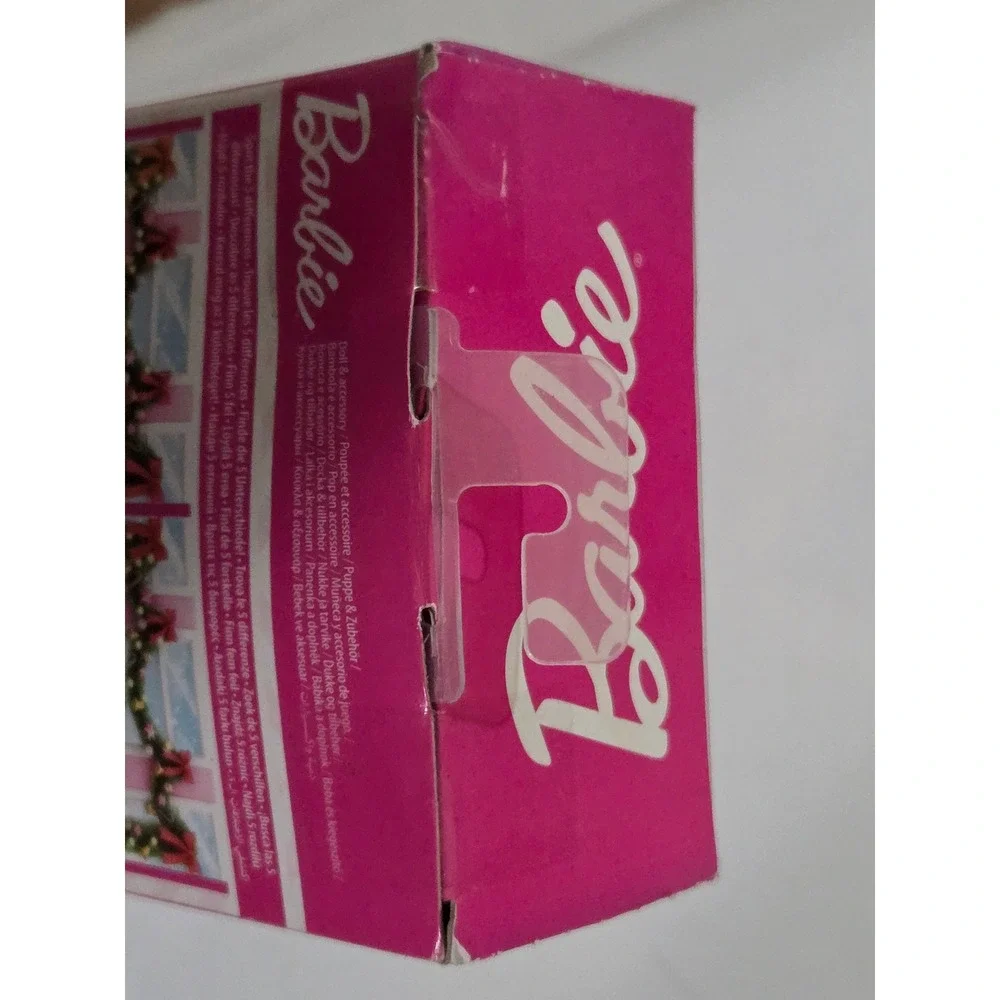 Barbie unwrap magic